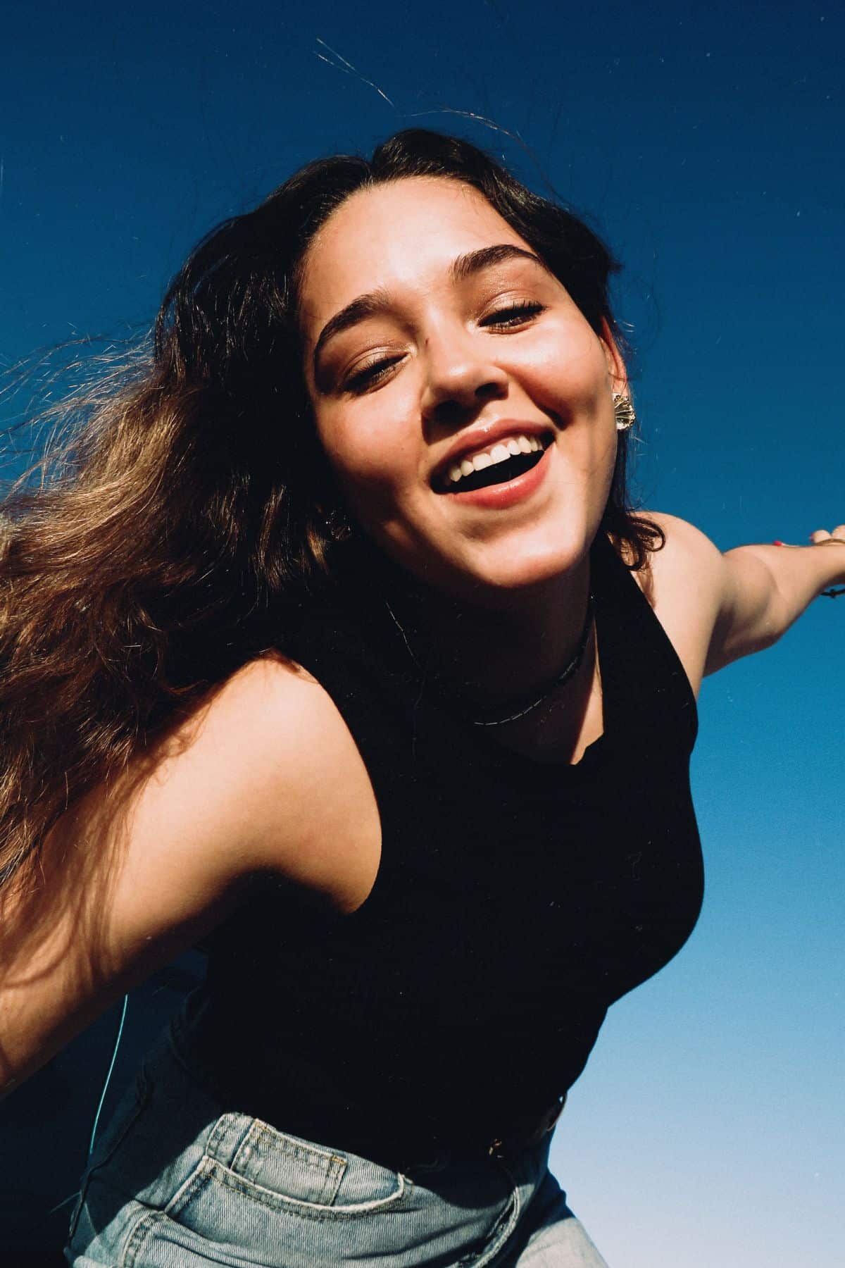 A girl under the sky